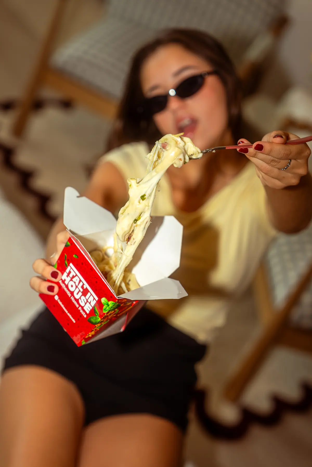 Customer enjoying an Ital'in House pasta box